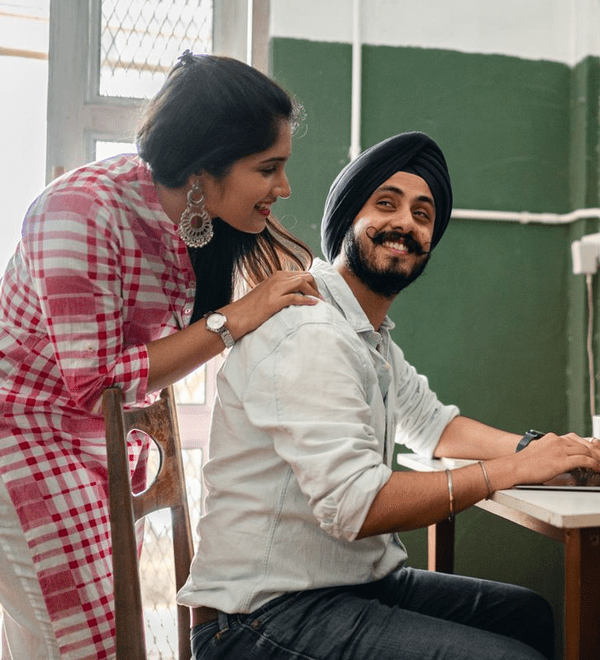 Indian small-business owners working online